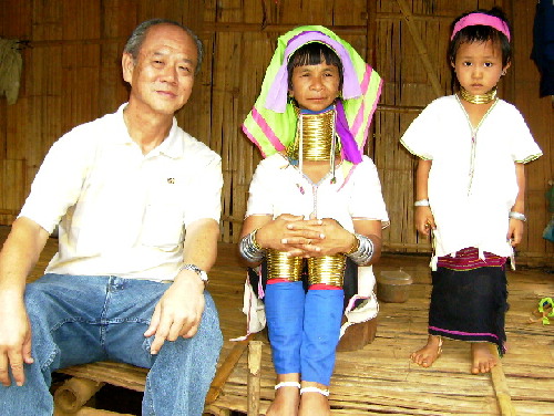 Writer sitting with the Karens with brass coils