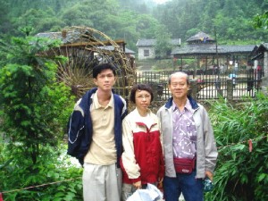 Writer's son(left), wife(centre) and himself(right) at a winery in Gu Po Mountain