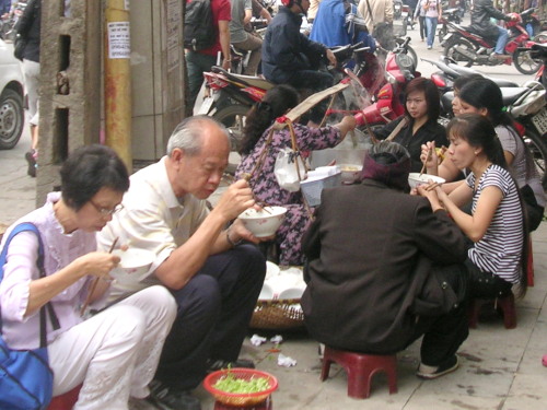 Writer and his wife having a roadside meal