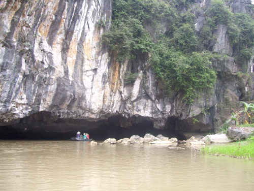 Entering the first Tam Co river cave