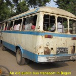 An old public bus passing by Nyaung Oo Market