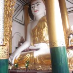 A Lord Buddha statue in a shrine at Shwedagon Pagoda