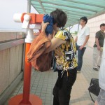 Using binoculars to view the North Korean side