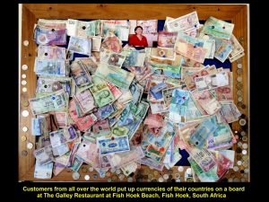 Foreign currencies pinned on a board by foreign customers of The Galley Restaurant