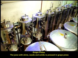 Juice with skins, seeds and solids are pressed in these machines
