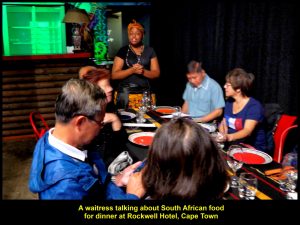 A waitress talking about South African food before it was served