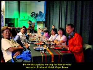 Malaysians waiting, patiently, for dinner to be served