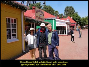 Choo Chaw and wife taking a photo with the gold mine tour-guide at the mine museum