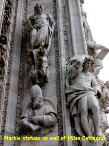 Marble statues on wall of Milan Cathedral