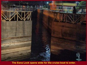 The lower gate opens wide for the cruise boat to enter.