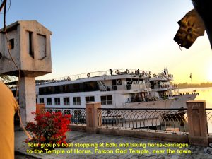 Tour group cruise boat on River Nile, Edfu, Egypt
