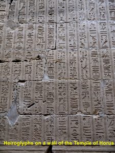Heiroglyphs on a wall of Temple of Horus, Edfu