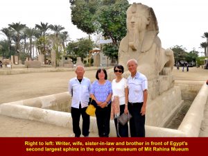 Right to left: Writer, wife. sister-in-law and brother standing in front of Egypt's seond largest Sphinx in the open air museum of Mit Rahina Museum